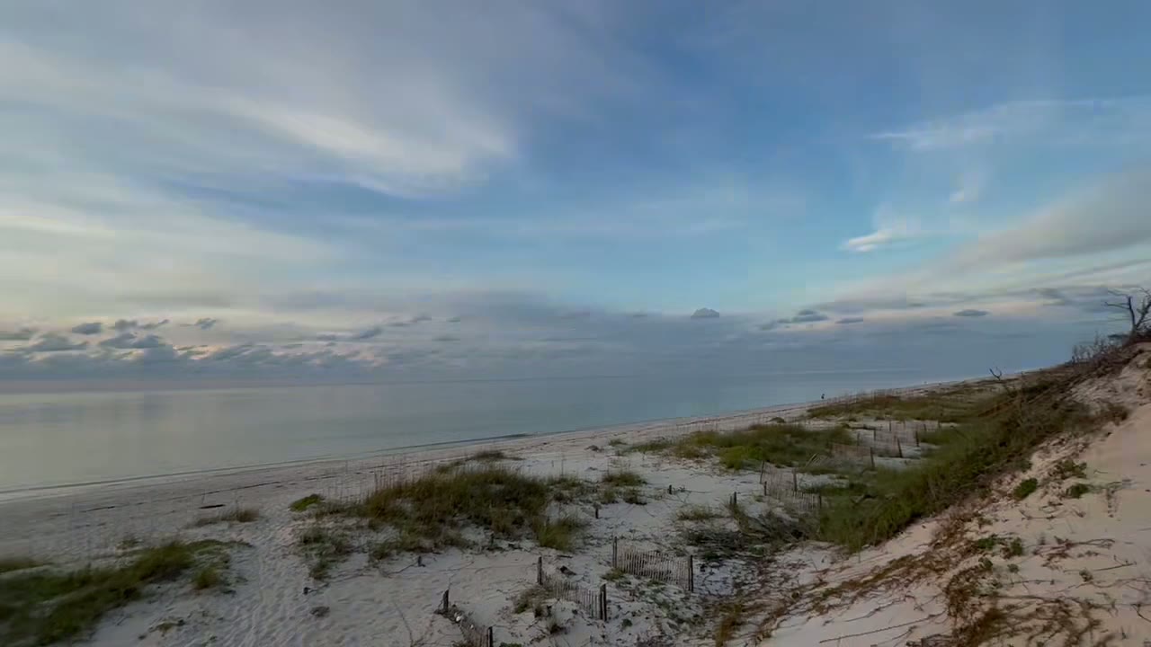 Video: the walk from the deck down the boardwalk to the beach at sunrise